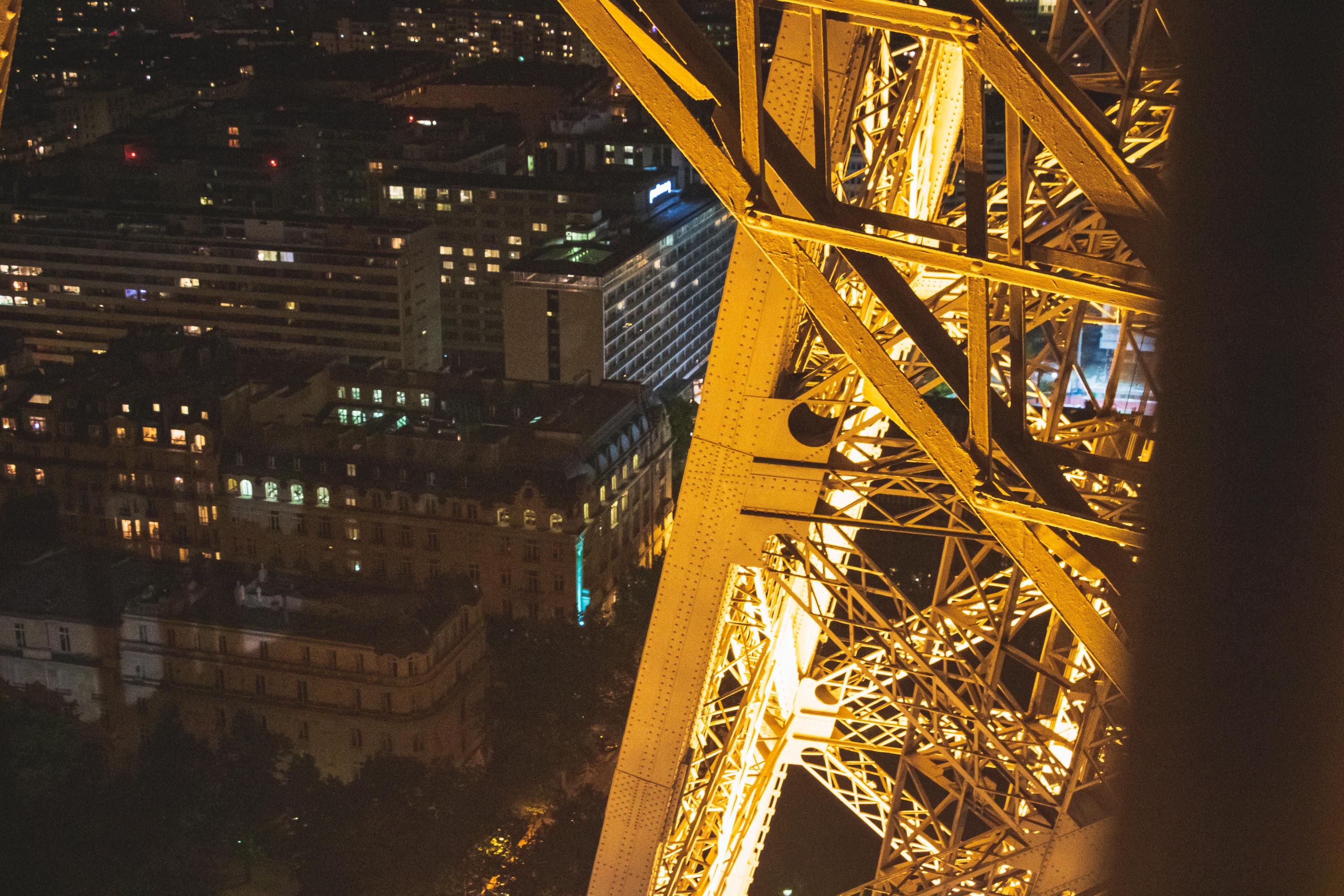 The rooftop architecture of Segovia, with snowy mountains shrouded in clouds behind